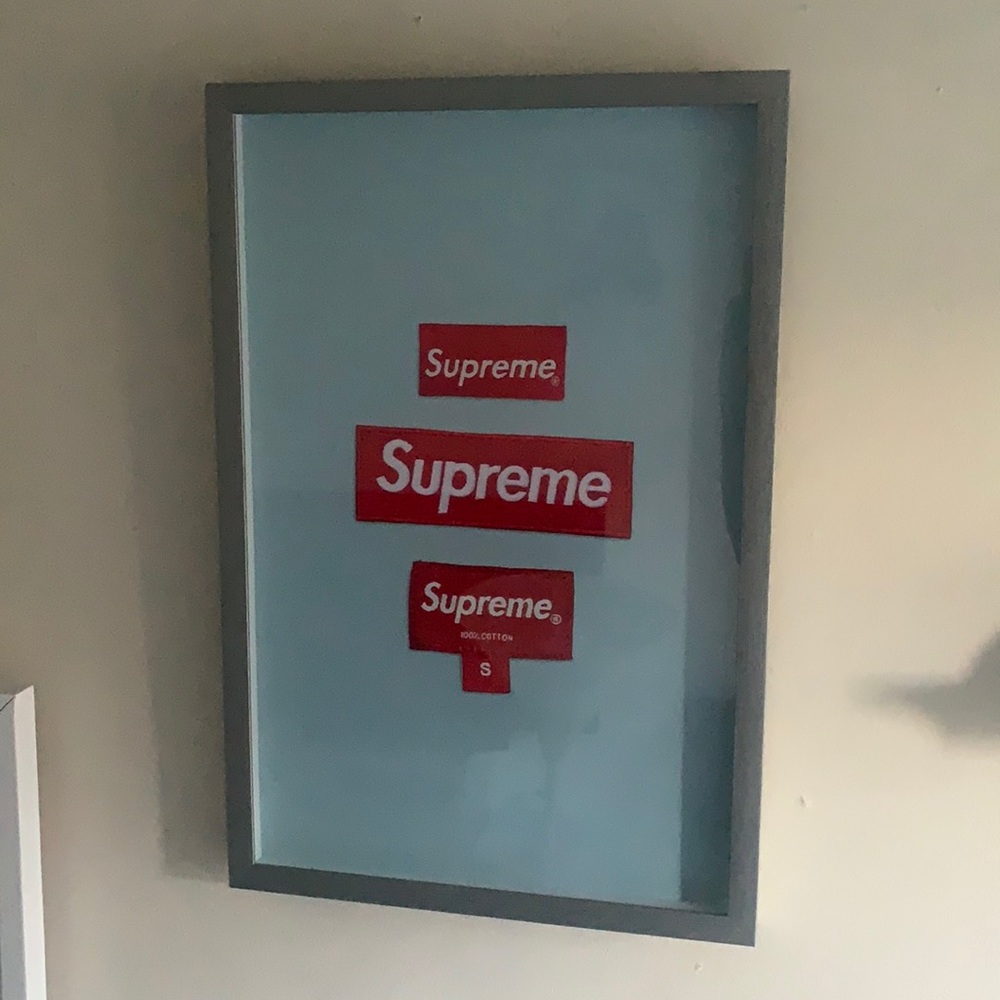 Supreme wall art with tempered glass frame